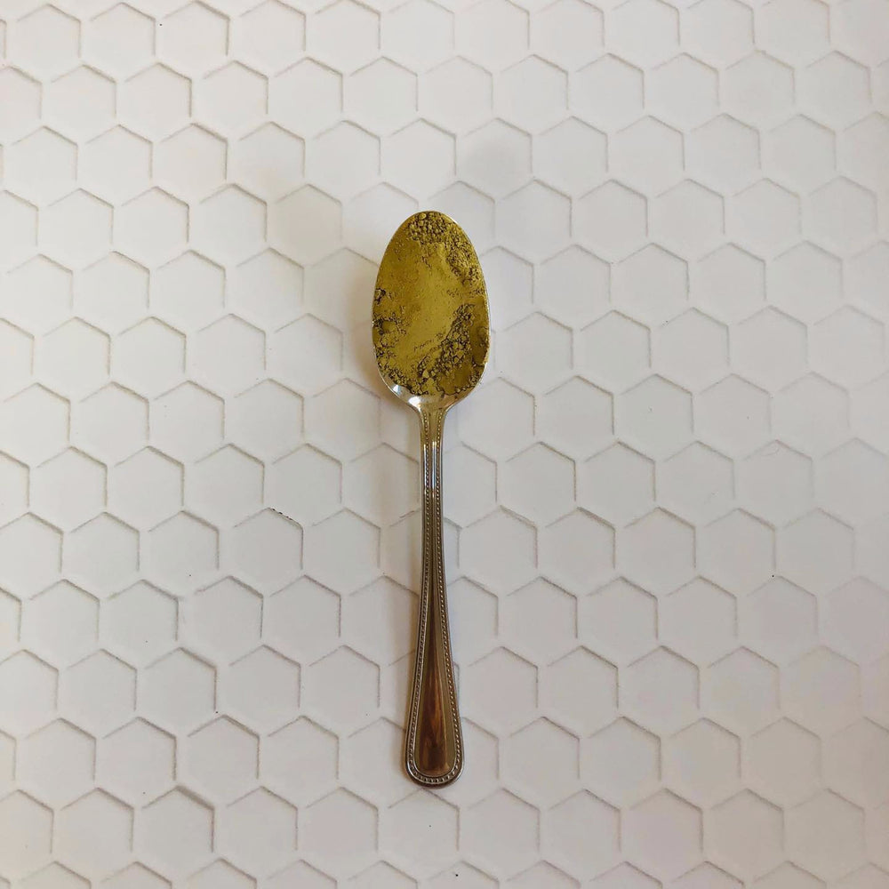 
                  
                    sea weed powder on gold spoon
                  
                