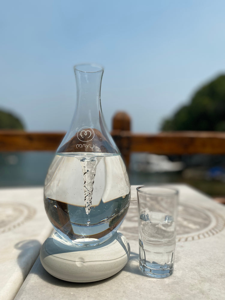 
                  
                    Mayu carafe vortex next to water glass
                  
                